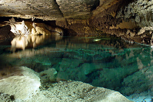 Photo: a cool pool in a Mystery Cave passageway.