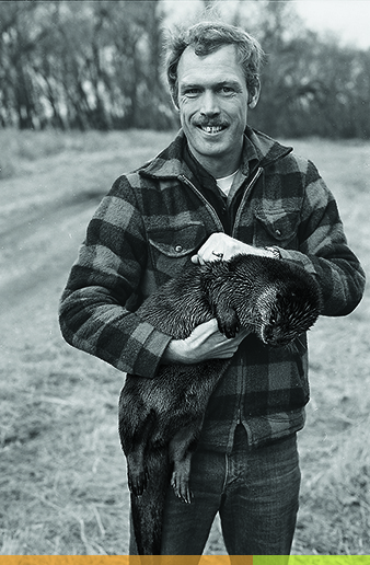 image of Carrol Henderson with otter.